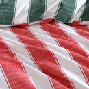 Christmas-themed quilt cover set creating a bright and joyful bedroom.