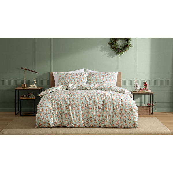 Festive quilt cover set creating a cheerful Christmas-themed bedroom.