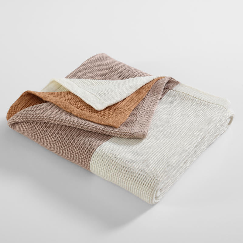 Beautiful neutral tones of cream, taupe, and caramel that complement any décor style
