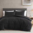 Black quilt cover set adding sleek, contemporary style to the bedroom.