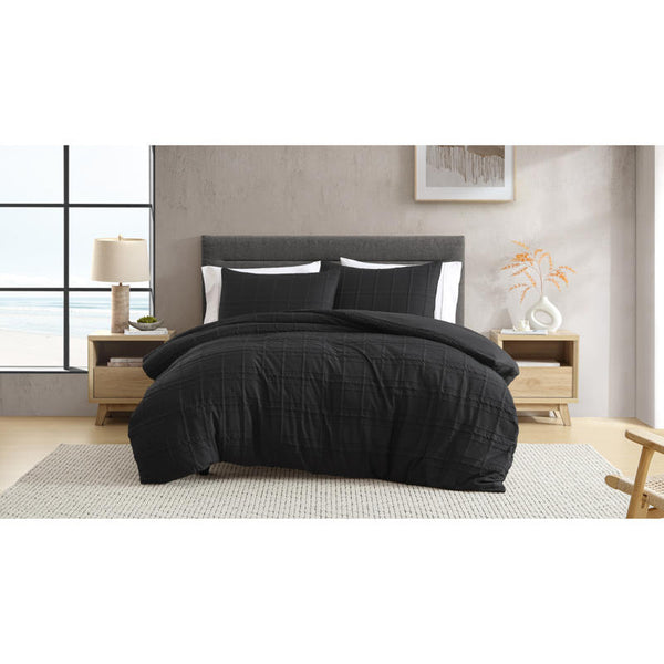 Black quilt cover set adding sleek, contemporary style to the bedroom.