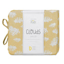 Close-up of white cloud pattern on yellow kids sheet set.