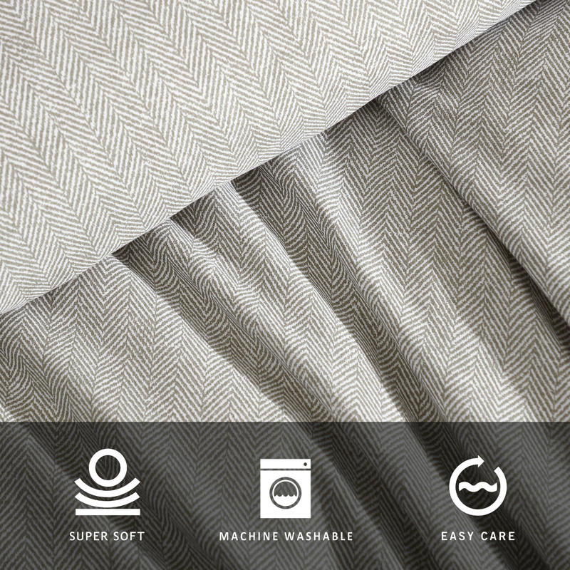 Kenneth Cole Herringbone Moss Quilt Cover Set styled on bed with neutral walls and modern décor.