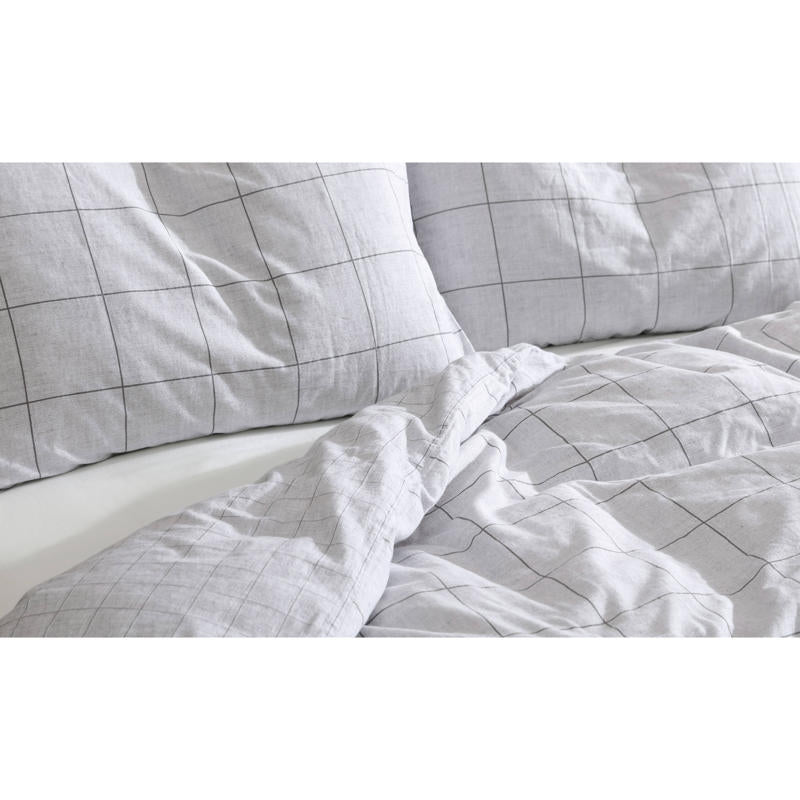 Close-up of grid pattern on Kenneth Cole Holden Grey Quilt Cover fabric.