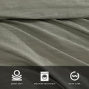 Modern interior with Kenneth Cole Nila Moss Green Quilt Cover Set on grey bedhead and neutral rug.