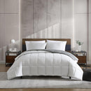 Reversible comforter showing light and dark grey tones.