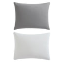 Reversible comforter showing light and dark grey tones.