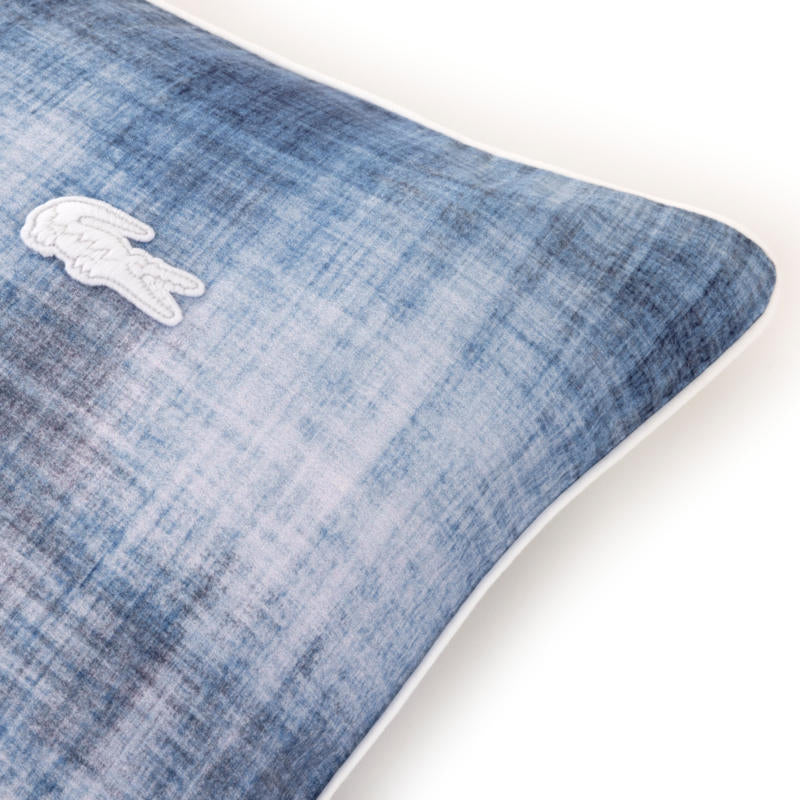 Lacoste L Denim European Pillowcase with washed denim-inspired texture.