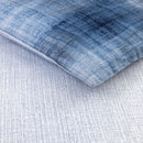 Bedroom styled with Lacoste L Denim Quilt Cover Set and rust accent cushions