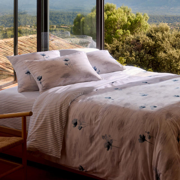 Bedroom styled with Lacoste L Shadow Quilt Cover Set in soft blue and grey tones