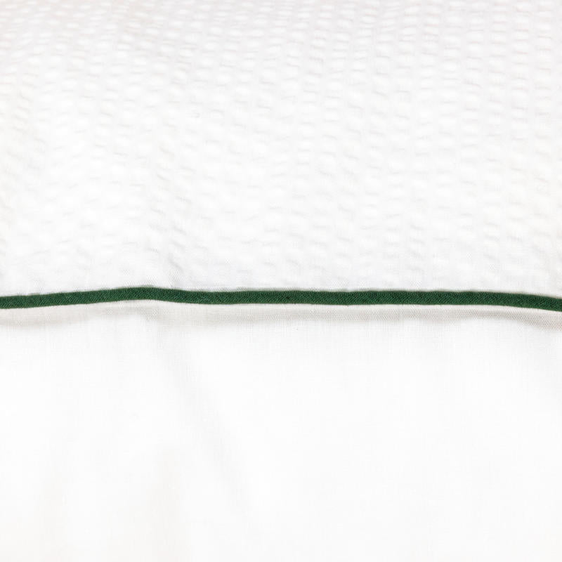 Lacoste L Tamis Blanc European Pillowcase in crisp white with green piping.