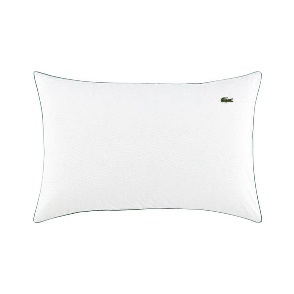 Close up of Lacoste L Tamis Blanc Pillowcase texture and embroidered logo.