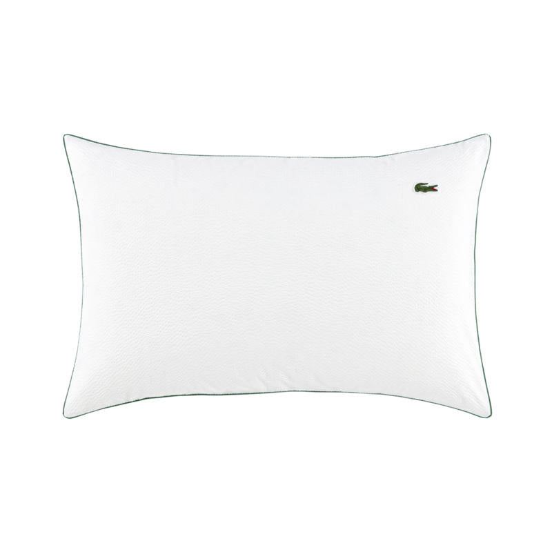 Close up of Lacoste L Tamis Blanc Pillowcase texture and embroidered logo.
