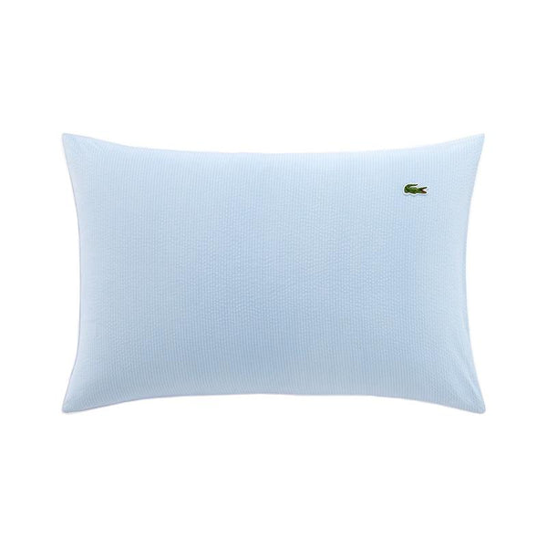Close up of Lacoste L Tamis Sky Pillowcase texture and embroidered logo