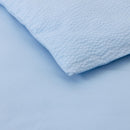 Lacoste L Tamis Sky Quilt Cover Set in soft blue with white piping and embroidered logo