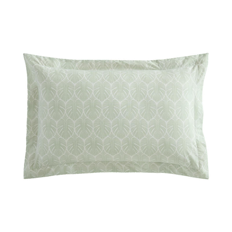 Reversible cotton quilt cover featuring light green and white leaf pattern.