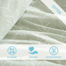 Reversible cotton quilt cover featuring light green and white leaf pattern.