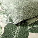 Tropical palm leaf quilt cover in soft, breathable cotton.