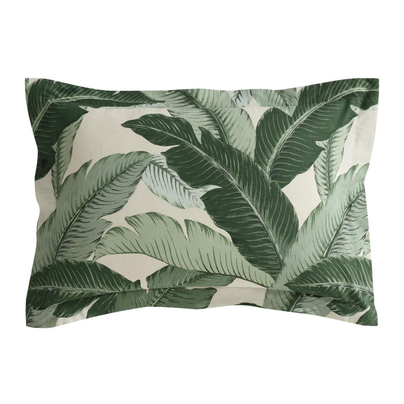 Tropical palm leaf quilt cover in soft, breathable cotton.
