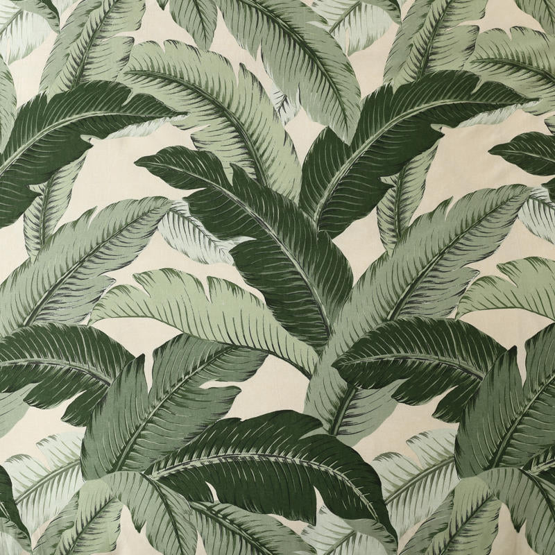 Tropical palm leaf quilt cover in soft, breathable cotton.