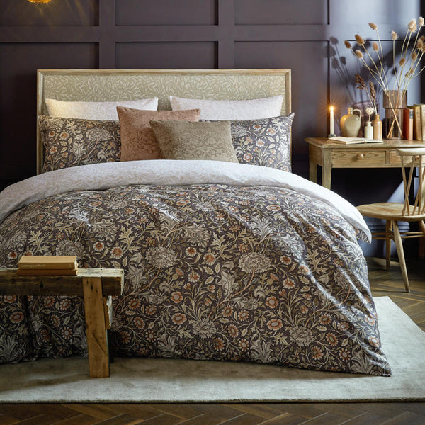 Bedroom styled with William Morris At Home Double Bough Heather bedding and decorative cushions