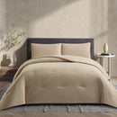 Lightweight doeskin cooling comforter with matching pillowcases.