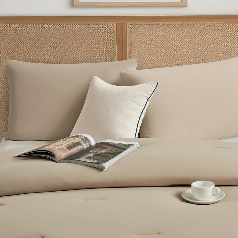 Lightweight doeskin cooling comforter with matching pillowcases.