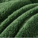 The Morgan and Reid Jungle Snuggle Fleece Pillowcase Pair features a rectangular green design with plush texture and slightly rounded corners, crafted from soft snuggle fleece, shown on a plain white background.