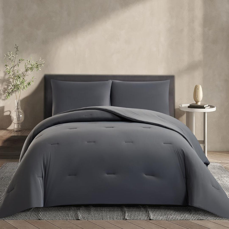 Lightweight cooling comforter with matching pillowcases in deep grey.