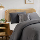 Lightweight cooling comforter with matching pillowcases in deep grey.
