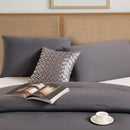 Lightweight cooling comforter with matching pillowcases in deep grey.
