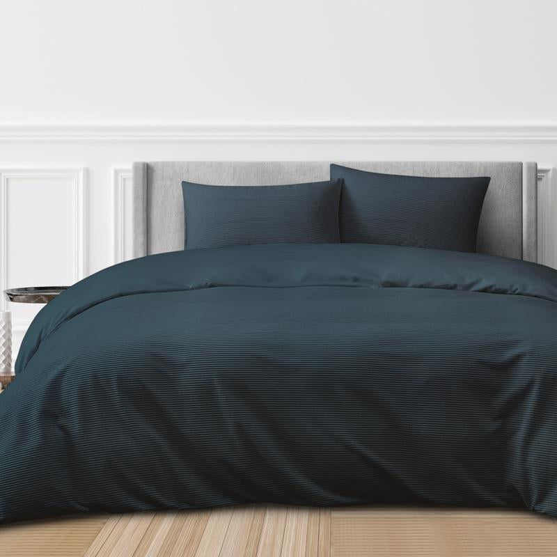 Close-up of Corduroy Ribbed Navy fabric showing soft ribbed detail.