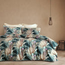 Seminyak Sunwashed Comforter Set in a warm-toned bedroom with woven pendant light.