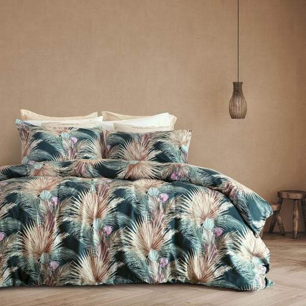 Seminyak Sunwashed Comforter Set in a warm-toned bedroom with woven pendant light.