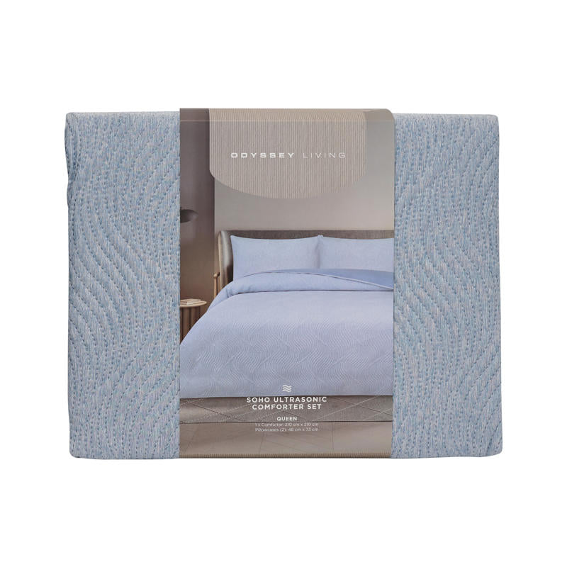 Modern bedroom featuring Odyssey Living Soho Comforter in calming blue tones.