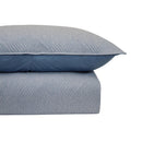 Modern bedroom featuring Odyssey Living Soho Comforter in calming blue tones.