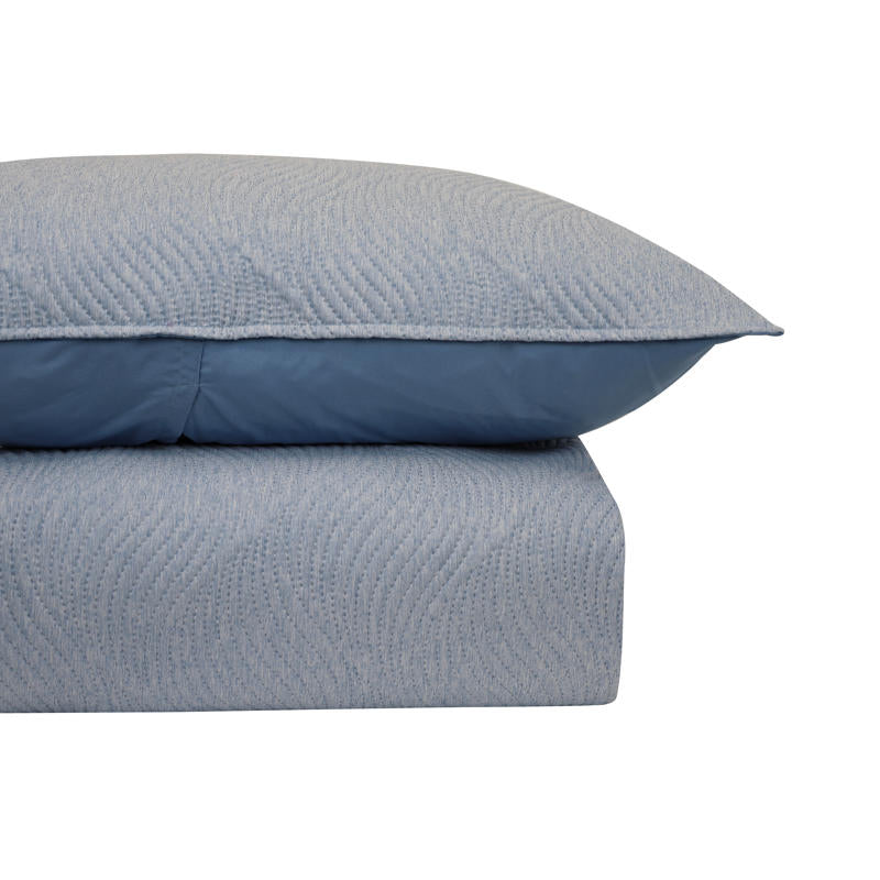 Modern bedroom featuring Odyssey Living Soho Comforter in calming blue tones.