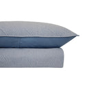 Modern bedroom featuring Soho Ultrasonic Blue Quilt Cover in soft blue tones.