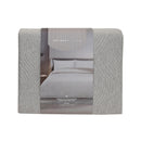 Neutral Odyssey Living Soho Comforter adding calm, contemporary style to any space.
