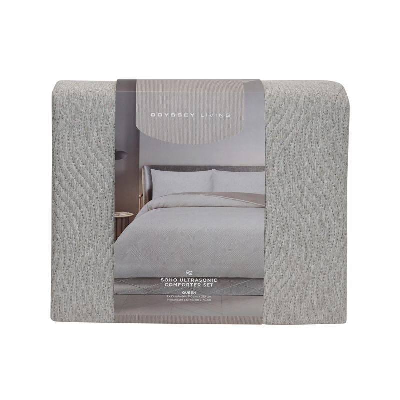 Neutral Odyssey Living Soho Comforter adding calm, contemporary style to any space.