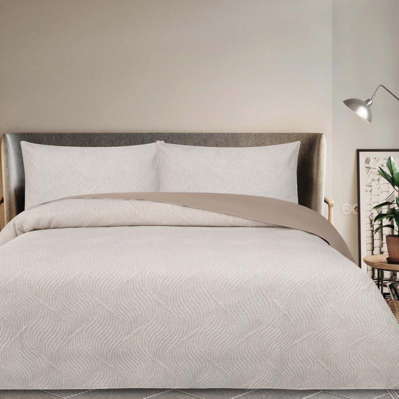 Minimalist bedroom featuring Odyssey Living Soho Ultrasonic Linen Quilt Cover with natural decor.