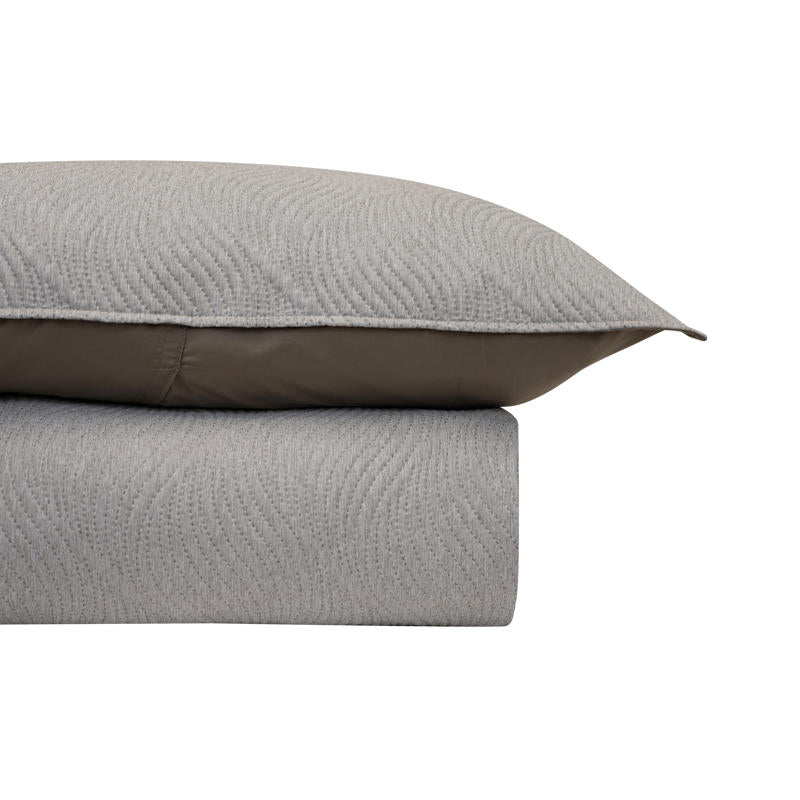 Minimalist bedroom featuring Odyssey Living Soho Ultrasonic Linen Quilt Cover with natural decor.