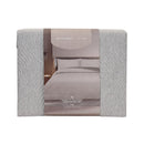 Modern bedroom featuring Odyssey Living Soho Silver Comforter with neutral decor.