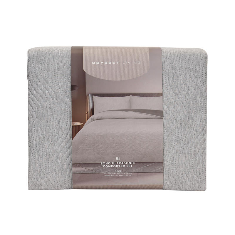 Modern bedroom featuring Odyssey Living Soho Silver Comforter with neutral decor.