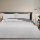 Modern bedroom featuring Odyssey Living Soho Silver Quilt Cover in cool grey tones.