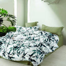 Bedroom featuring Odyssey Living Vietnam Cotton Quilt Cover Set with natural green tones.