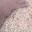 PIP Studio Garden of Dove Off-White Cushion with floral and dove design styled on bed.