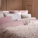 PIP Studio Garden of Dove Off-White Quilt Cover Set styled on a bed with soft floral detailing.