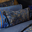 Decorative 35x60cm cushion in dark blue with elegant floral accents.