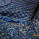 Decorative 35x60cm cushion in dark blue with elegant floral accents.